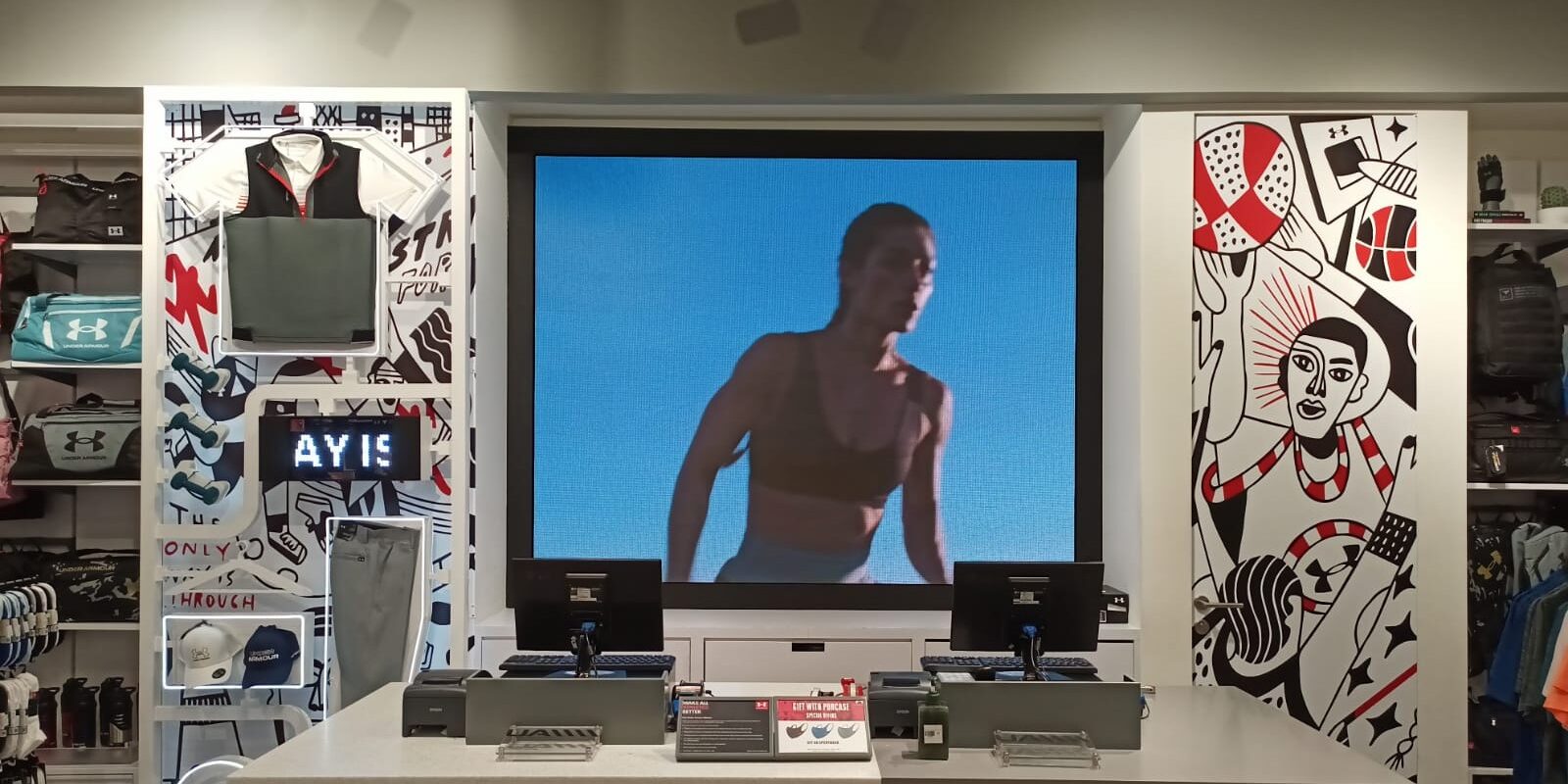 Under Armour_Indoor LED Screen_Jakarta_Indonesia_2025_Installation LED Screen Indoor LED screen installation at Under Armour retail store in Jakarta, Indonesia, showcasing high-resolution sports visuals as part of the 2025 digital display upgrade.